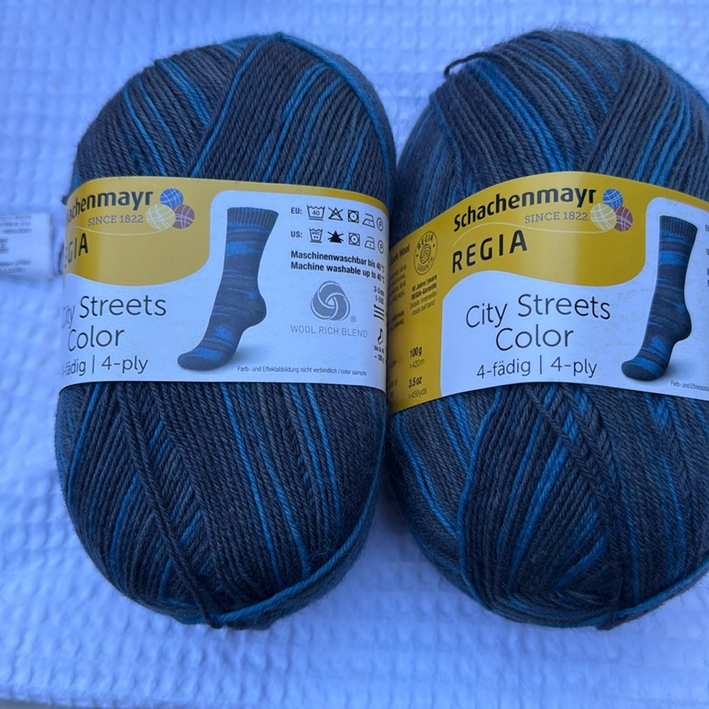 Regia city streets sock yarn.  Lot of 2